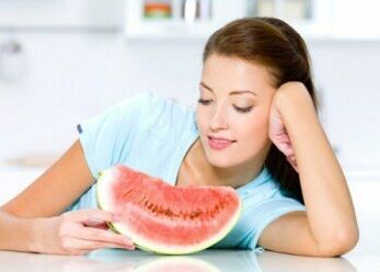 A girl follows a watermelon diet to fight overweight. 
